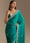 Teal Green Satin Saree With Zardosi Moti Embroidery And Scallop Border