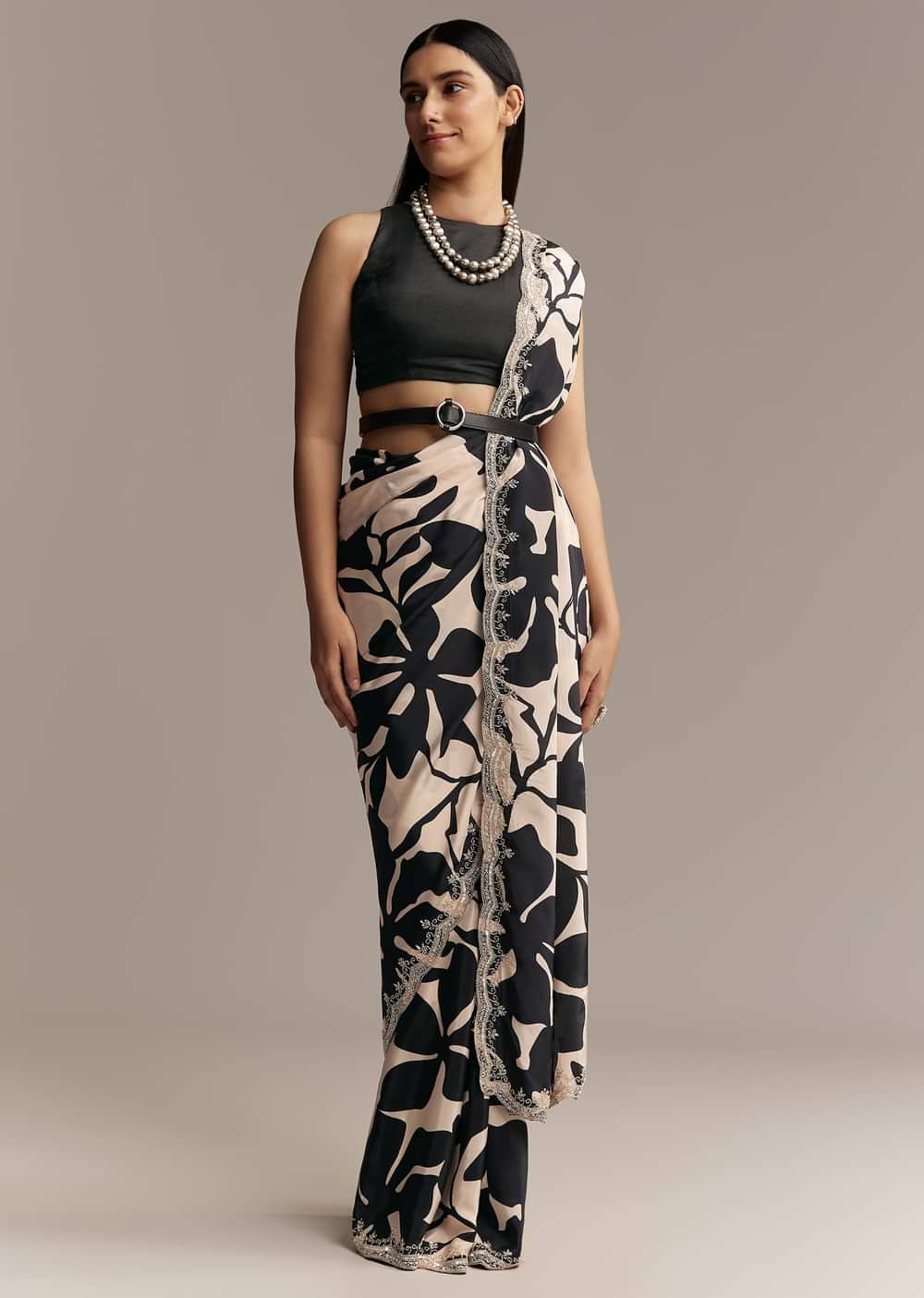 Beige Crepe Saree With Black Floral Print And Embellished Border