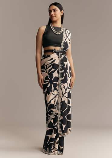 Beige Crepe Saree With Black Floral Print And Embellished Border