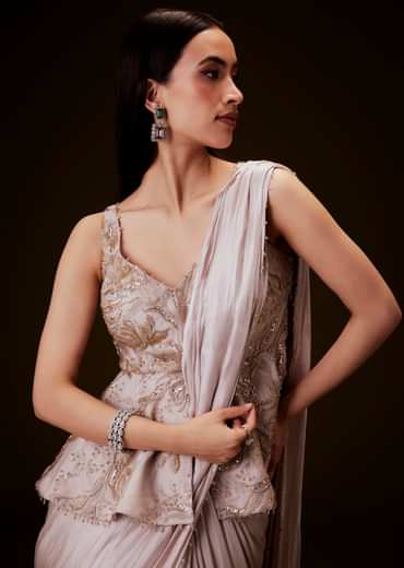 Champion Peach Sequence Embroidered Peplum Top With Saree