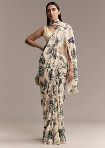 Off White Crepe Saree With Black Floral Print And Embroidered Border