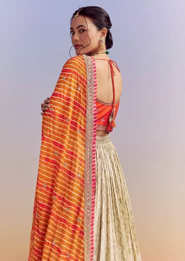 Orange Brocade Silk Bridesmaid Lehenga With Leheriya Dupatta
