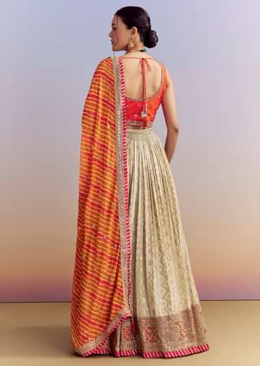 Orange Brocade Silk Bridesmaid Lehenga With Leheriya Dupatta