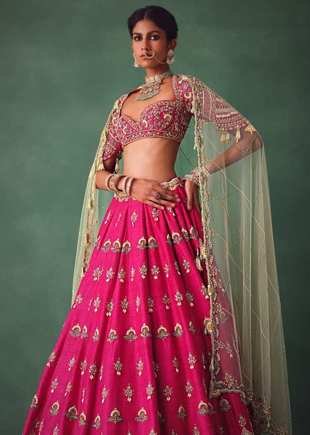 Deep Pink Bridal Butti Work Lehenga With Tassels on Blouse And Dupatta