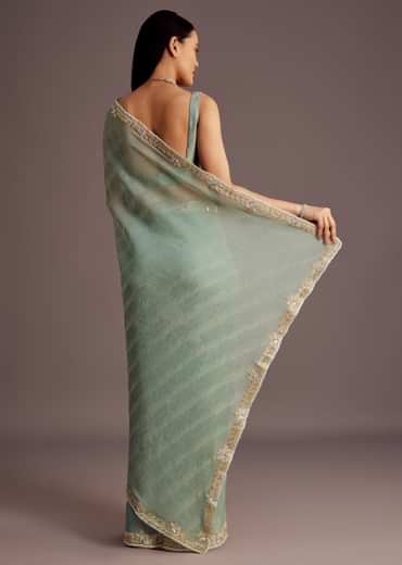 Turquoise Blue Crush Tissue Cutdana Work Saree With Embroidered Border