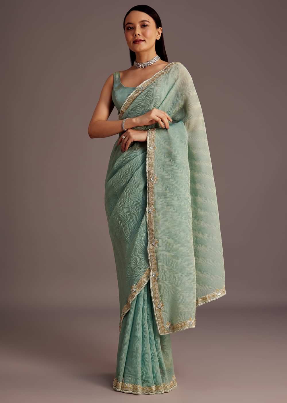 Turquoise Blue Crush Tissue Cutdana Work Saree With Embroidered Border