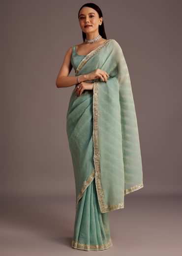 Turquoise Blue Crush Tissue Cutdana Work Saree With Embroidered Border