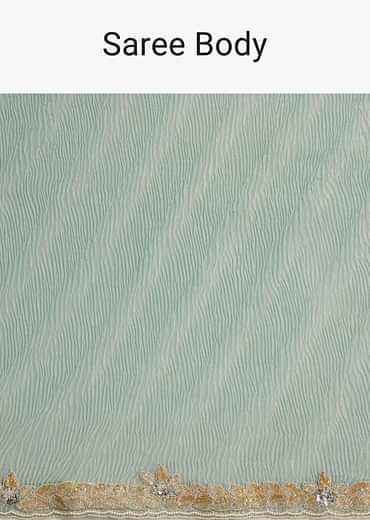 Turquoise Blue Crush Tissue Cutdana Work Saree With Embroidered Border