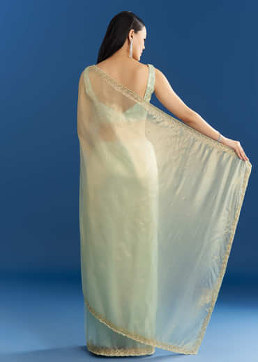 Aqua Blue Organza Tissue Embellishd Saree With Scallop Border