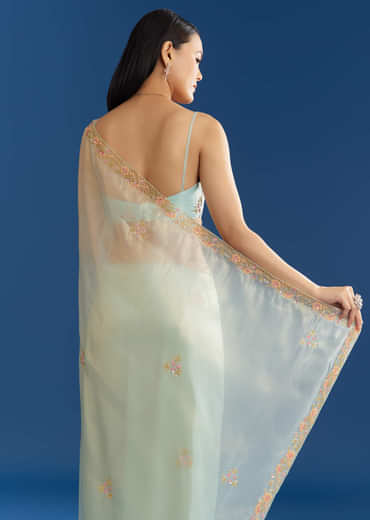 Aqua Blue Organza Tissue Saree With Multicolor Border