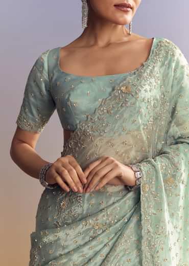 Aqua Blue Tissue Saree With Cutwork And Unstitched Embellished Blouse