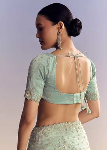 Aqua Blue Tissue Saree With Cutwork And Unstitched Embellished Blouse