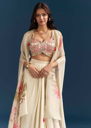 Beige Crop Top Skirt Set With Resham Work And Floral Cape