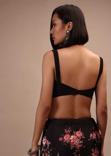 Black Sleeveless Blouse In Raw Silk With Sweetheart Neckline. Thick Strap And Adjustable Tassel Dori