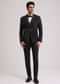 Black Suiting Tuxedo With Metallic Chain And Stone Work