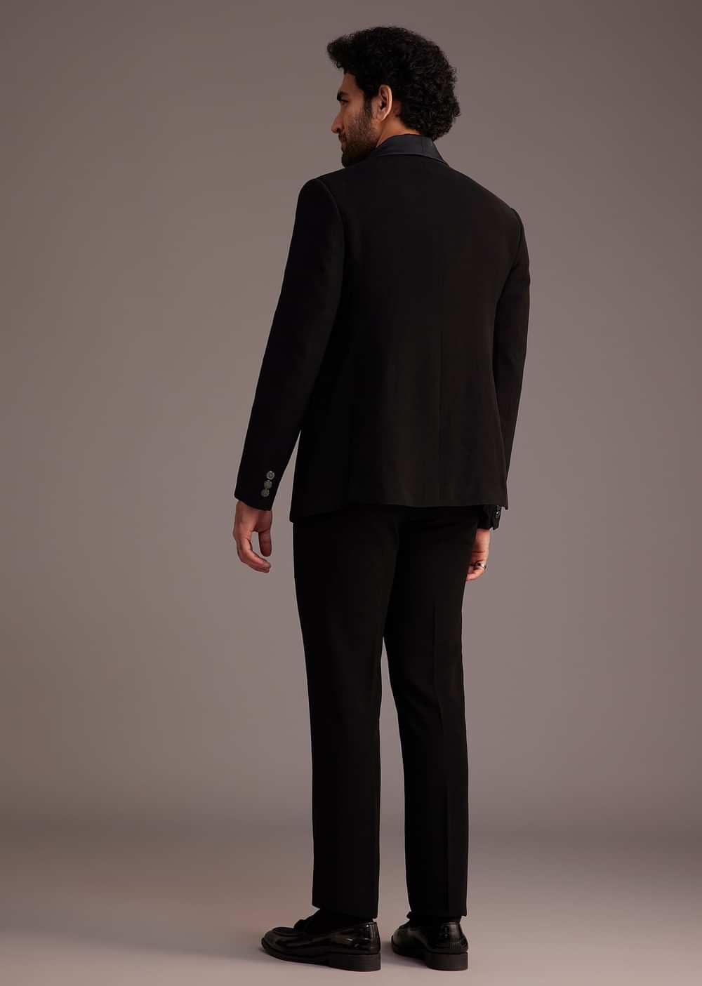 Black Tuxedo With Beaded Embellishments And Satin Lapel