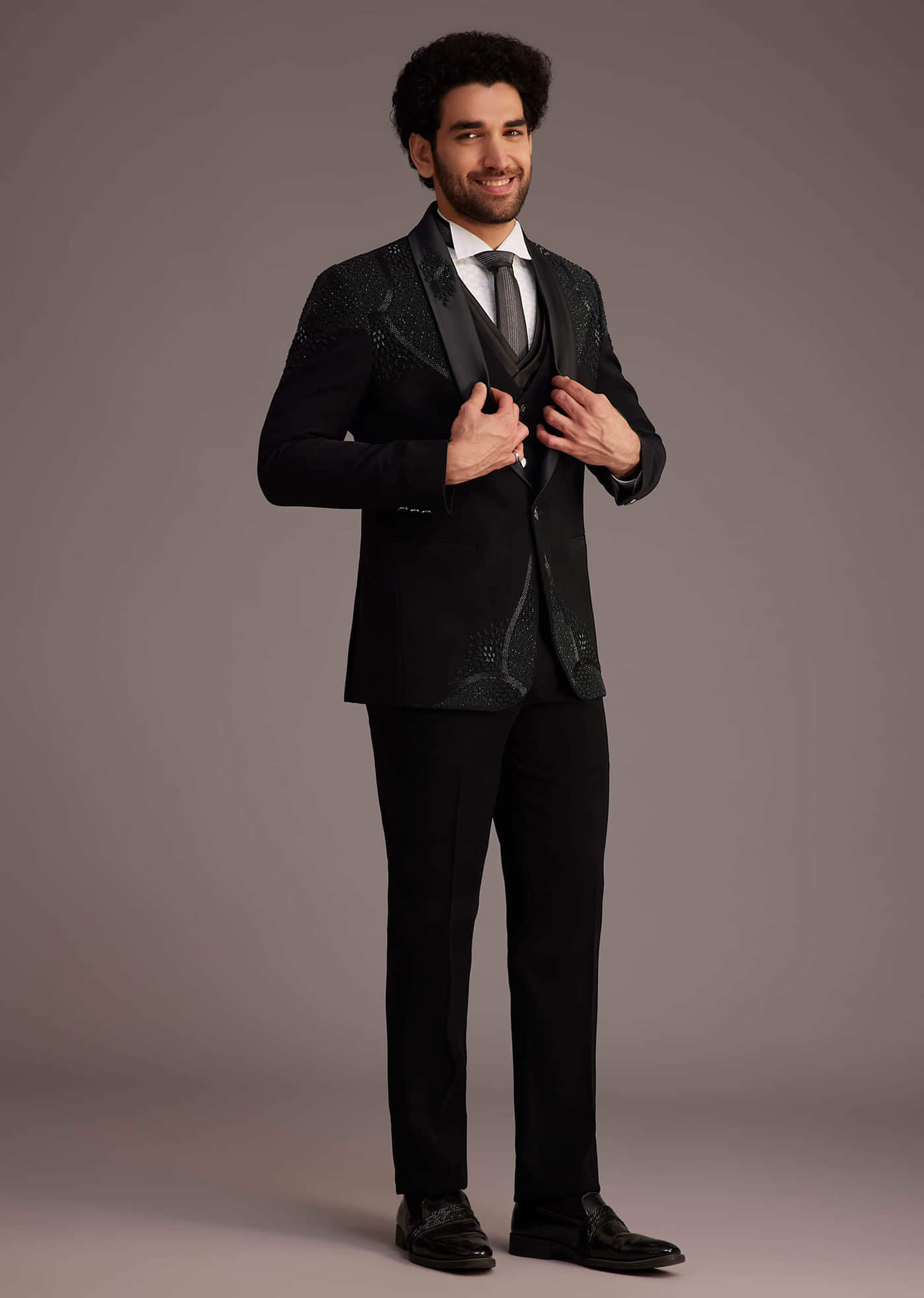 Black Tuxedo With Beaded Shoulder Detailing And Satin Lapel