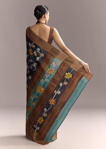 Blue Cotton Hand Painted Saree With Floral Motifs And Brown Border