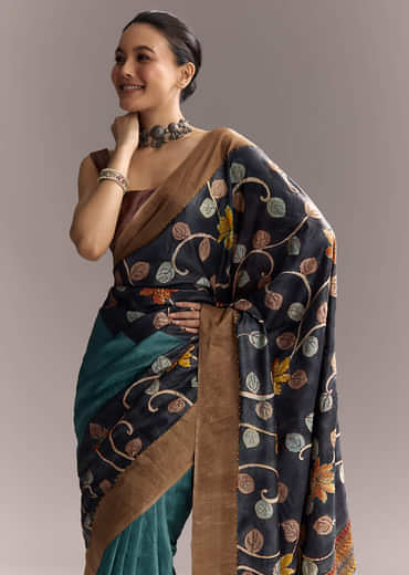 Blue Cotton Hand Painted Saree With Floral Motifs And Brown Border