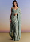 Blue Tissue Saree With Cutdana Sequins And Beads Embroidered Border