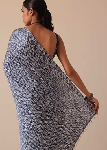 Blue Printed Saree In Satin With Tassel Detail And Unstitched Blouse Fabric