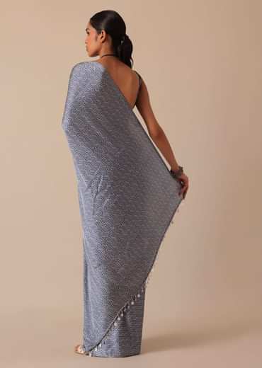 Blue Printed Saree In Satin With Tassel Detail And Unstitched Blouse Fabric