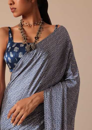 Blue Printed Saree In Satin With Tassel Detail And Unstitched Blouse Fabric