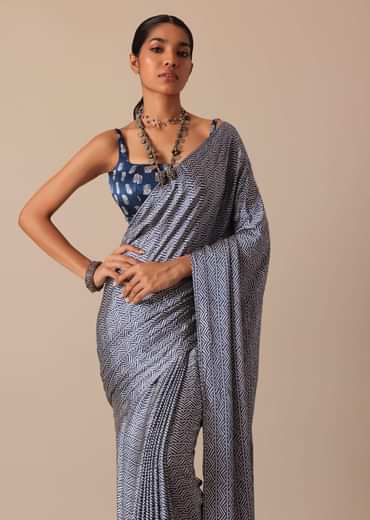 Blue Printed Saree In Satin With Tassel Detail And Unstitched Blouse Fabric