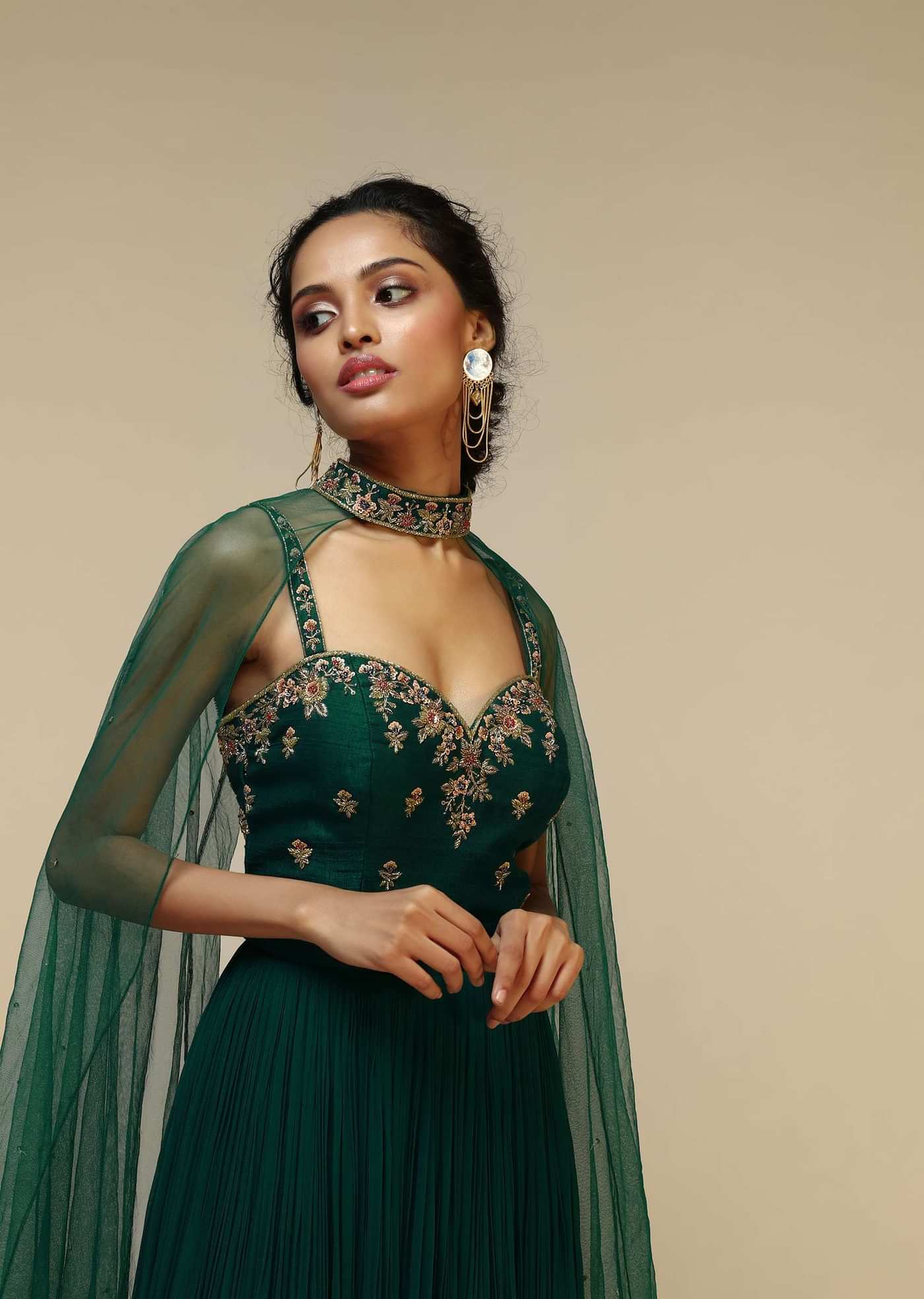 Bottle Green Anarkali Gown With Hand Embroidered Floral Design Using Multi Colored Sequins And Cut Dana Work