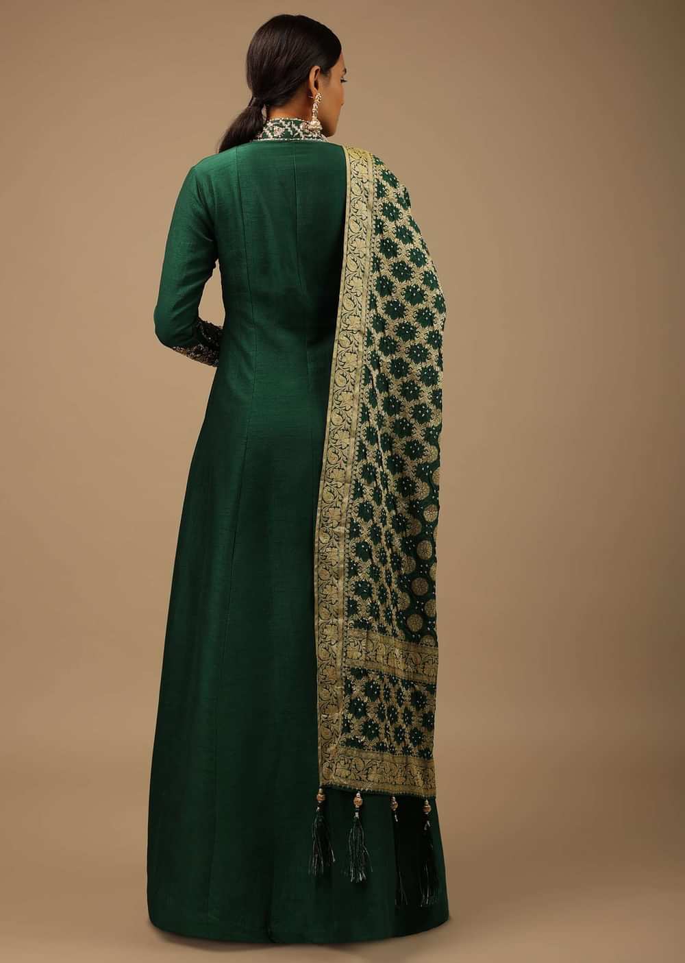 Bottle Green Anarkali Suit In Raw Silk With Hand Embroidery And A Brocade Dupatta Enhanced With Bandhani