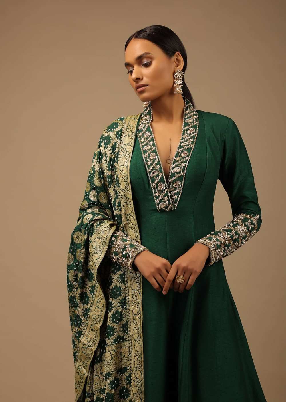 Bottle Green Anarkali Suit In Raw Silk With Hand Embroidery And A Brocade Dupatta Enhanced With Bandhani
