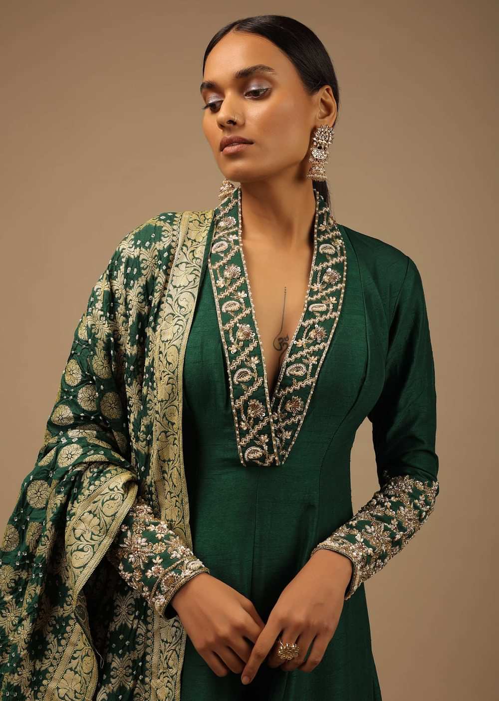 Bottle Green Anarkali Suit In Raw Silk With Hand Embroidery And A Brocade Dupatta Enhanced With Bandhani