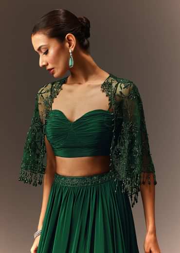Bottle Green Tiered Lehenga With Net Cape