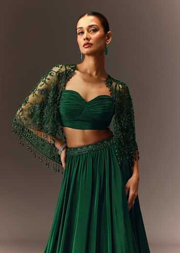 Bottle Green Tiered Lehenga With Net Cape