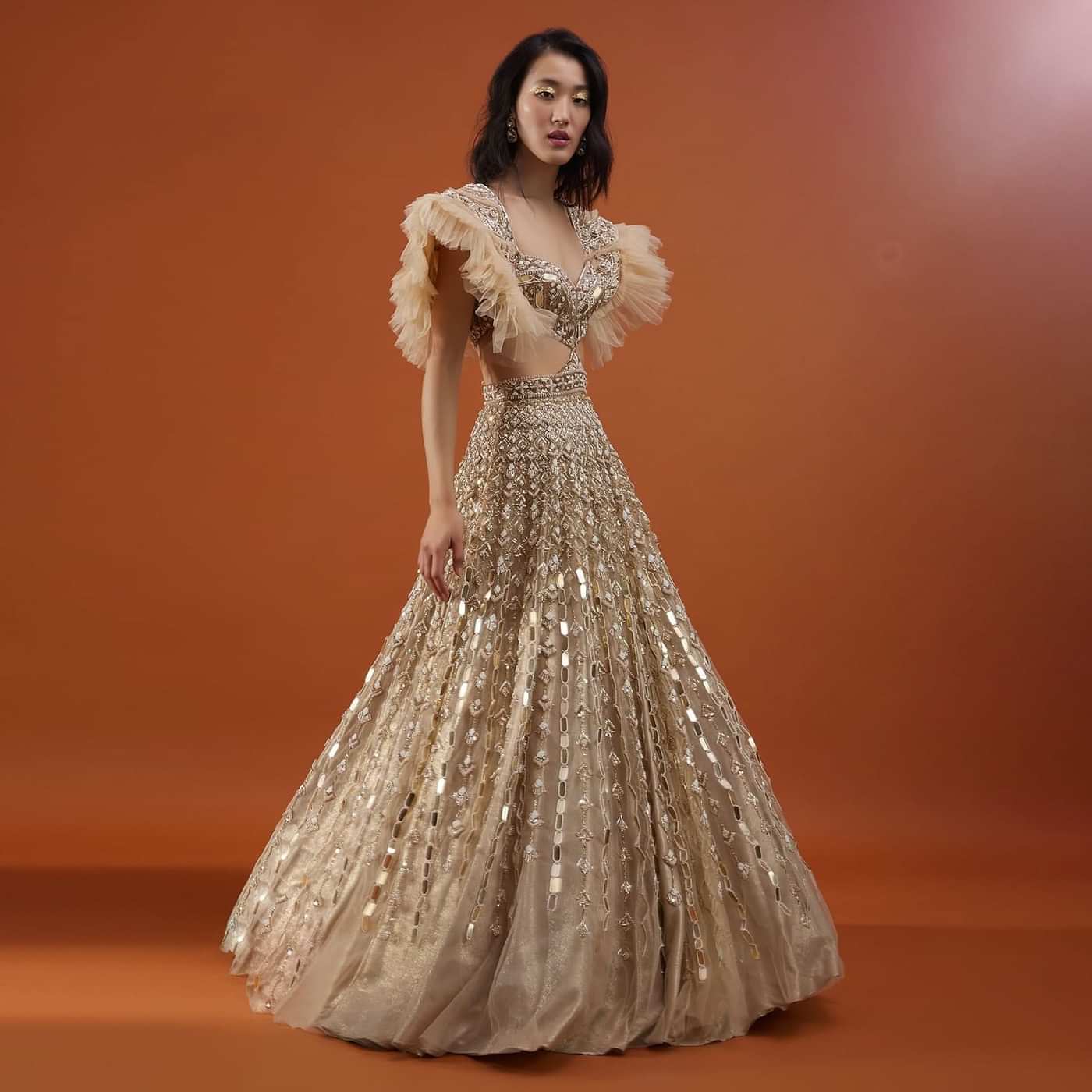 Champagne Gold Angelic Gown In Net With Ruffle Sleeves And Mirror Work - NOOR 2022