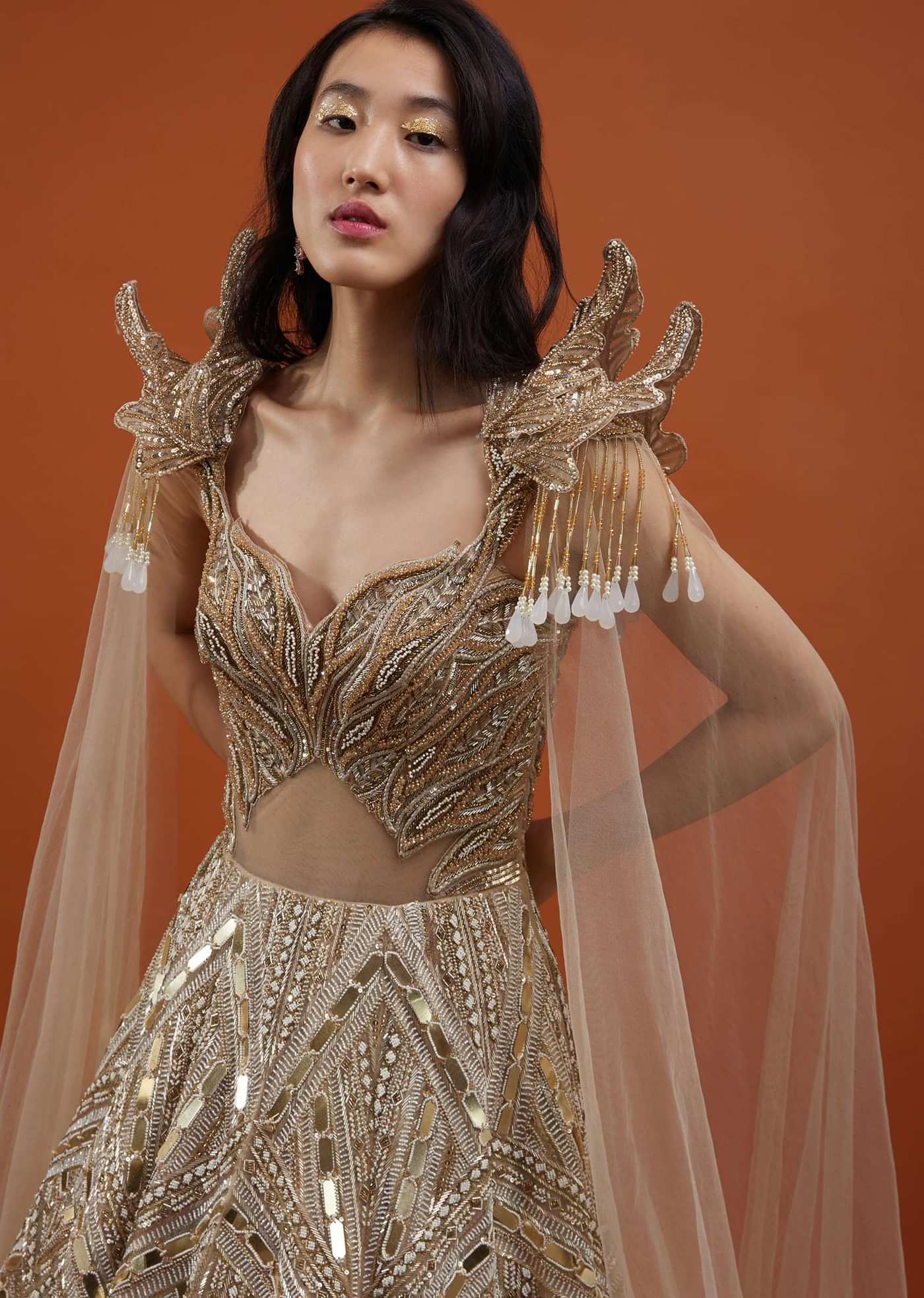 Champagne Gold Divine Gown In Net With Ruffle Frill Adornment - NOOR 2022