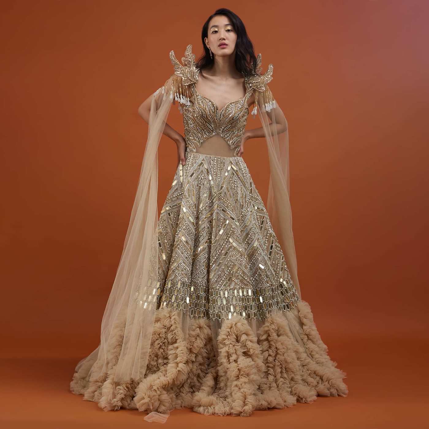 Champagne Gold Divine Gown In Net With Ruffle Frill Adornment - NOOR 2022