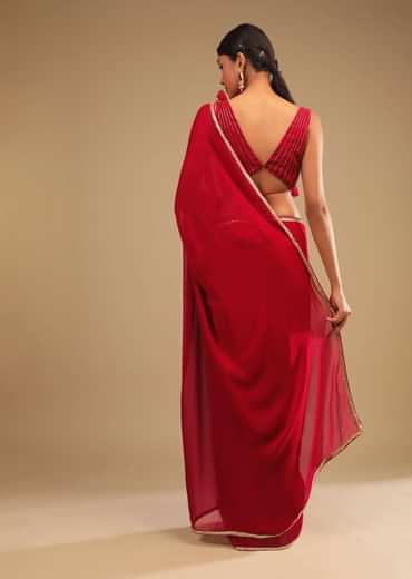 Cherry Red Saree In Georgette With Sequins And Cut Dana Embellished Border And A Ruffle Frill Adorned Crop Top
