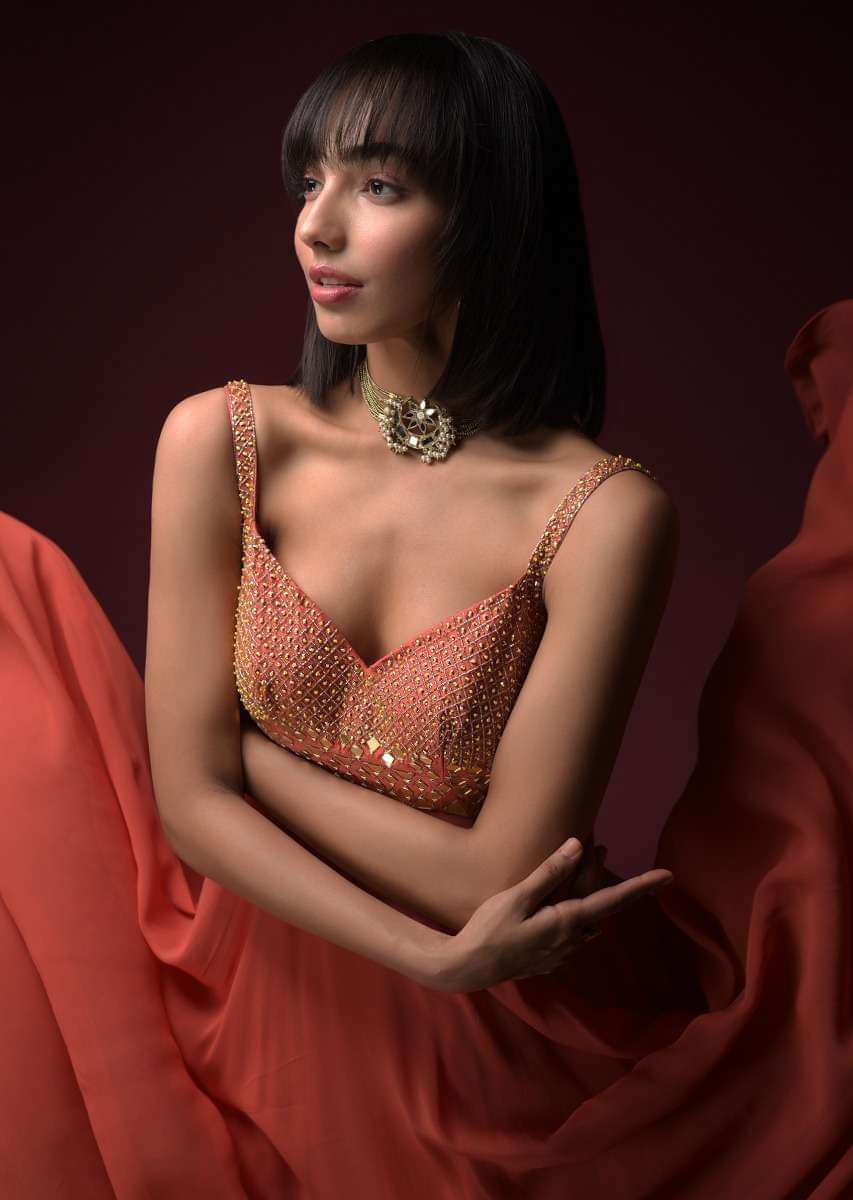 Coral Anarkali Suit With Geometric Shaped Mirror Accented Bodice And Fun Layered Hemline