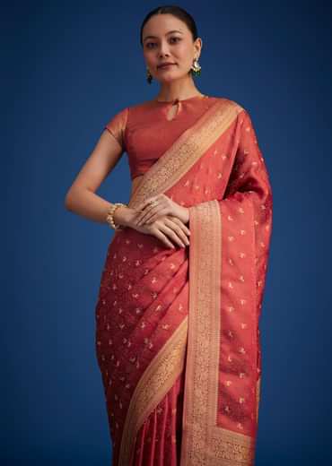 Dusky Orange Tissue Silk Saree With Zari Border And Butti Work