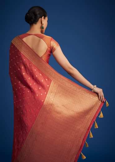 Dusky Orange Tissue Silk Saree With Zari Border And Butti Work