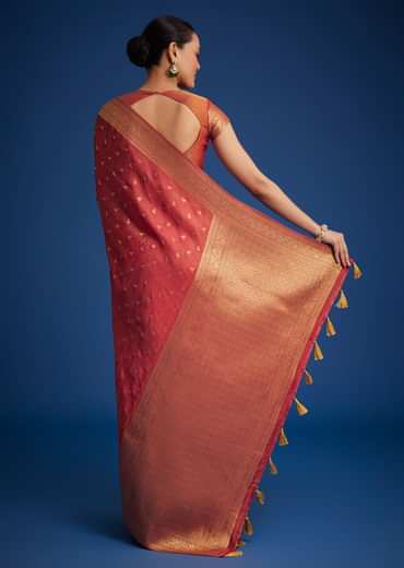 Dusky Orange Tissue Silk Saree With Zari Border And Butti Work