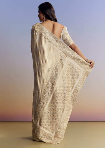 Cream Jacquard Silk Saree With Zari Brocade And Zardosi Embellished Pallu