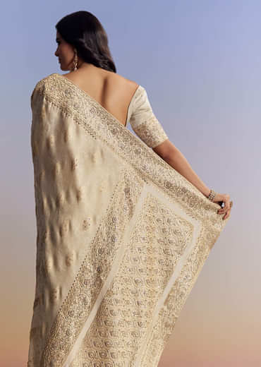 Cream Jacquard Silk Saree With Zari Brocade And Zardosi Embellished Pallu