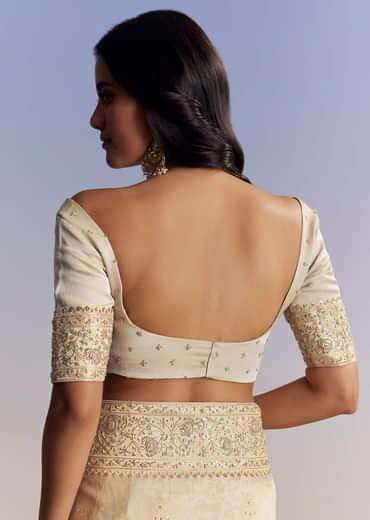 Cream Jacquard Silk Saree With Zari Brocade And Zardosi Embellished Pallu