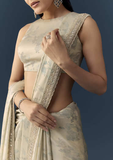 Cream Satin Saree with Floral Print and Unstitched Blouse