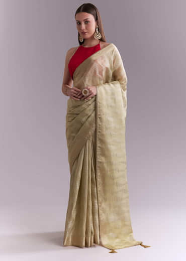 Cream Tissue Saree With Subtle Weave And Zari Border