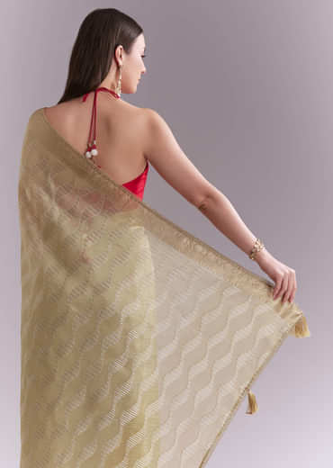 Cream Tissue Saree With Subtle Weave And Zari Border