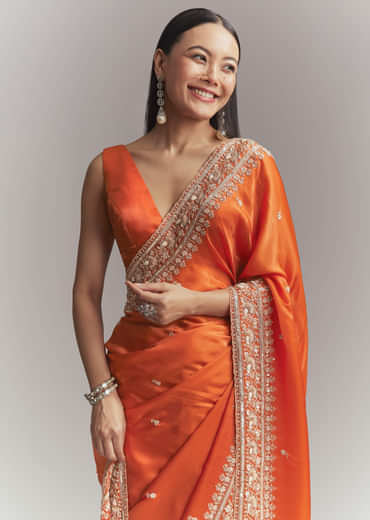 Dusky Orange Satin Embroidered Saree With Heavy Hand Embroidery