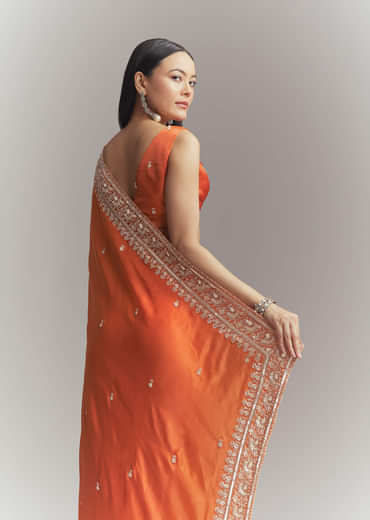 Dusky Orange Satin Embroidered Saree With Heavy Hand Embroidery